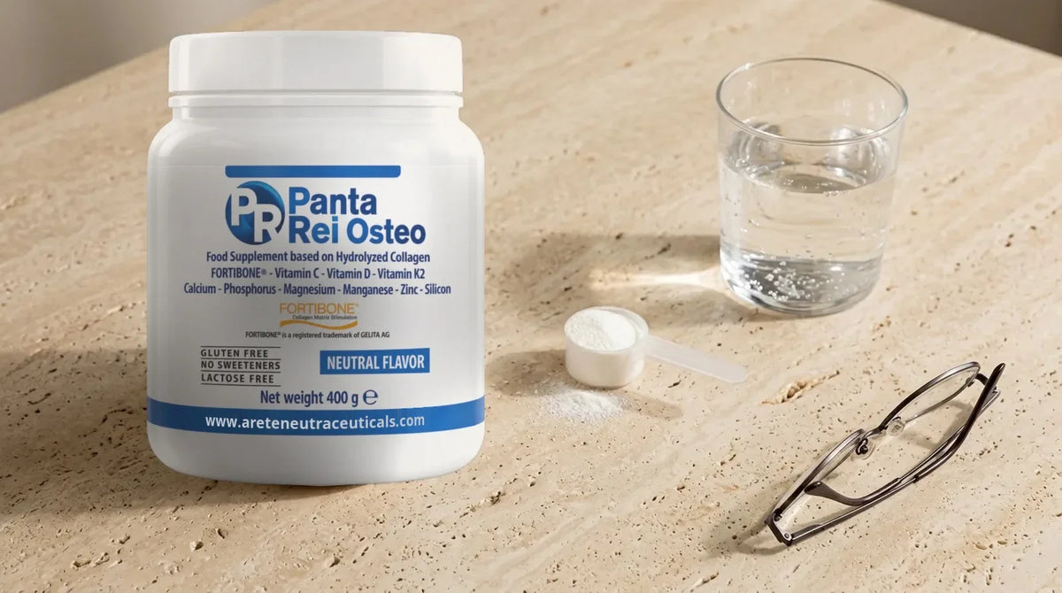 Panta Osteo sul tavolo, con un bicchiere d'acqua e il misurino