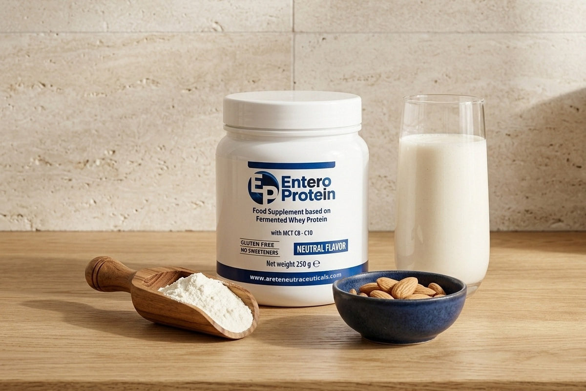 Un misurino di legno con la polvere accanto al barattolo di Enteroprotein